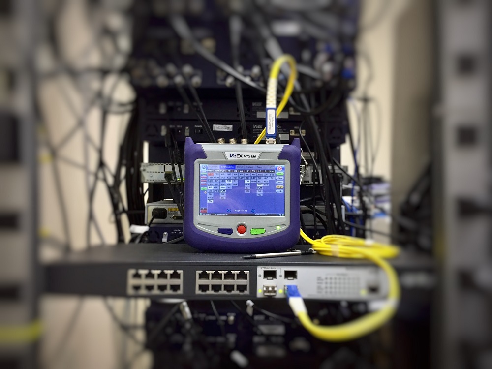 technical measurement equipment evaluating an advanced fiber optic network
